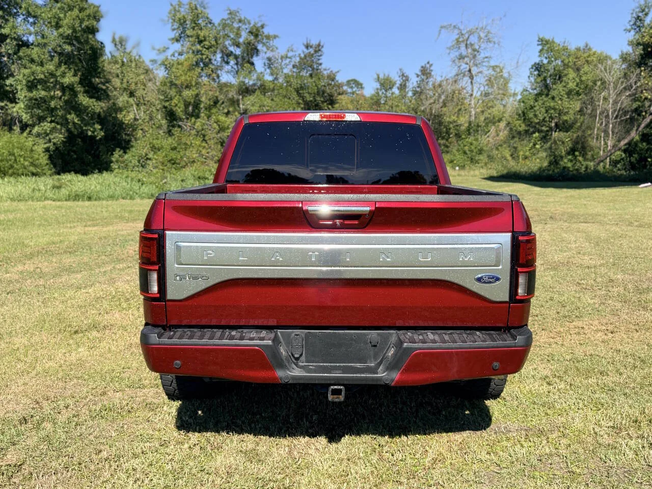 Used 2015 Red Ford Platinum 4x4 4dr SuperCrew 5.5 ft. SB image 5