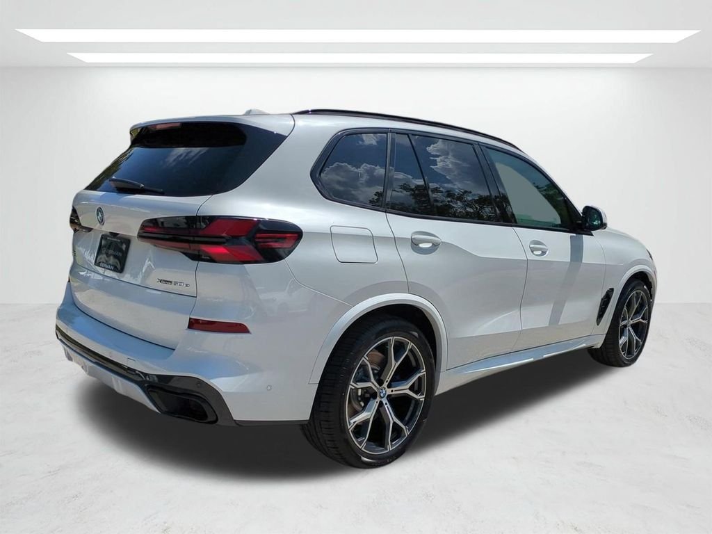 New 2026 White Metallic BMW xDrive50e image 4