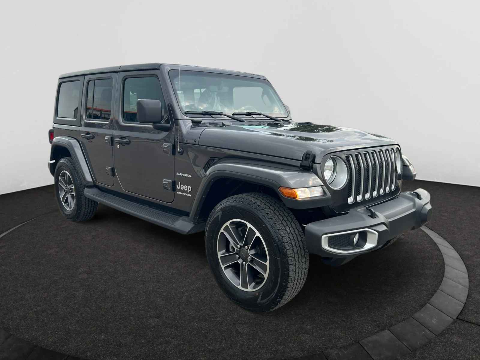 Used 2023 Granite Crystal Metallic Jeep SAHARA image 7
