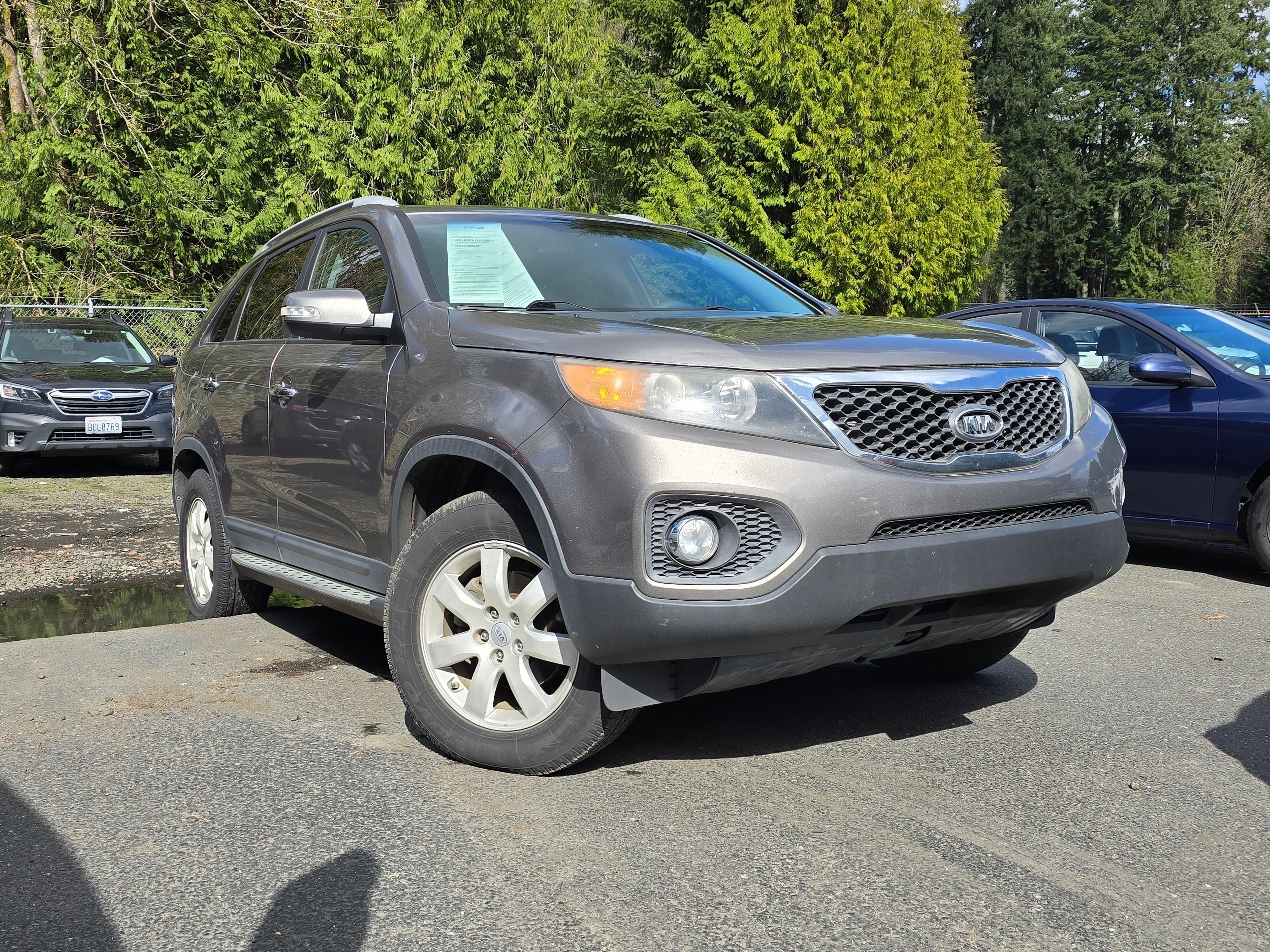 Used 2011 Kia Sorento LX with VIN 5XYKT3A19BG052197 for sale in Olympia, WA