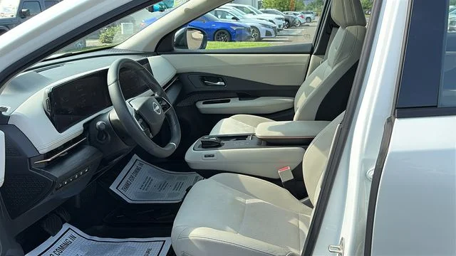 Certified Used 2024 White Nissan EVOLVE+ e-4ORCE image 9