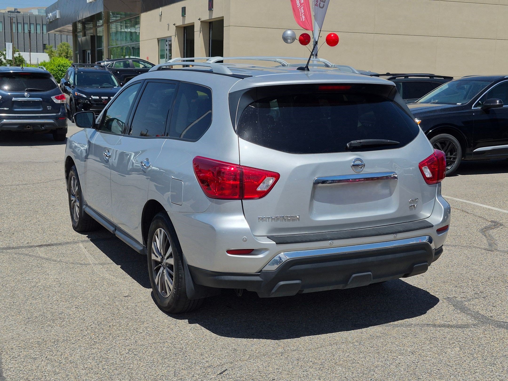 Used 2017 Brilliant Silver Metallic Nissan SV image 5