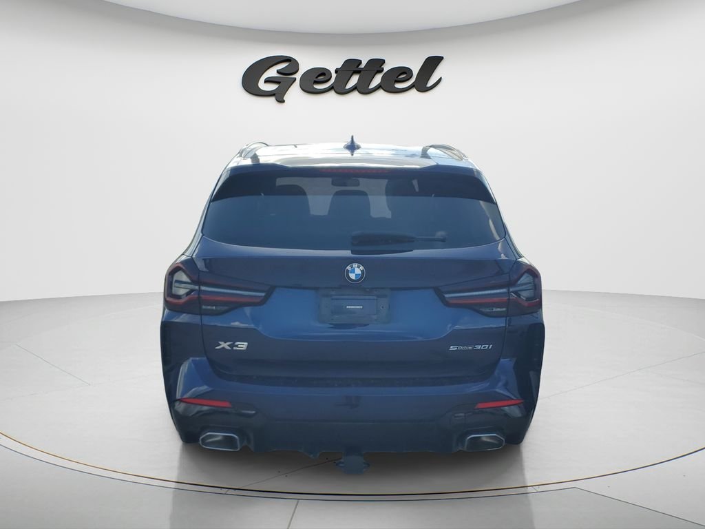 Used 2022 Blue BMW sDrive30i image 4