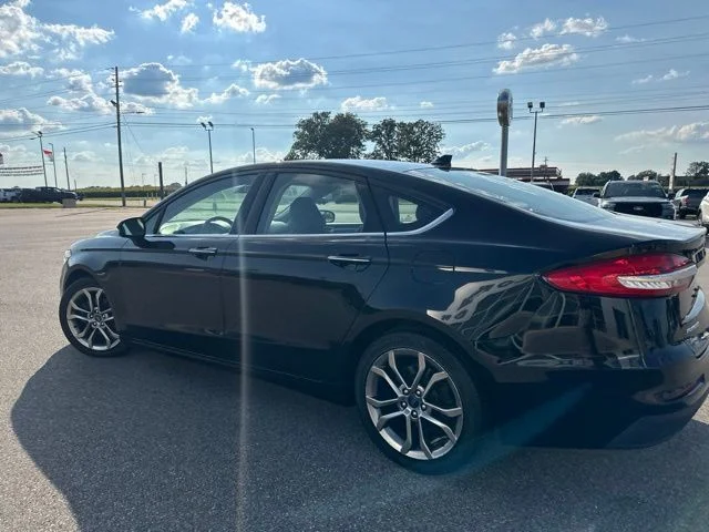 Used 2020 Agate Black Metallic Ford SEL image 23