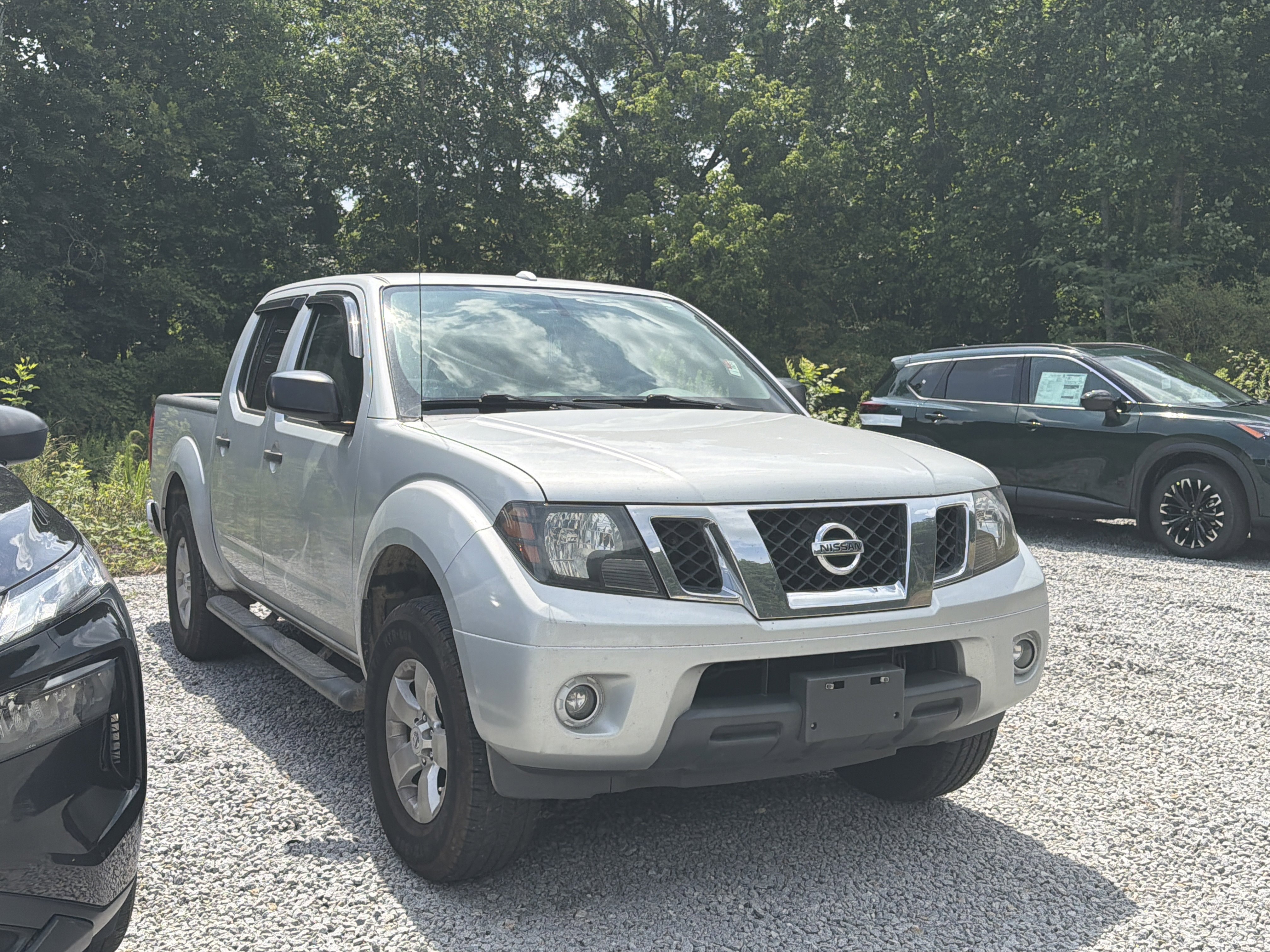 Used 2013 Brilliant Silver Nissan SV image 1