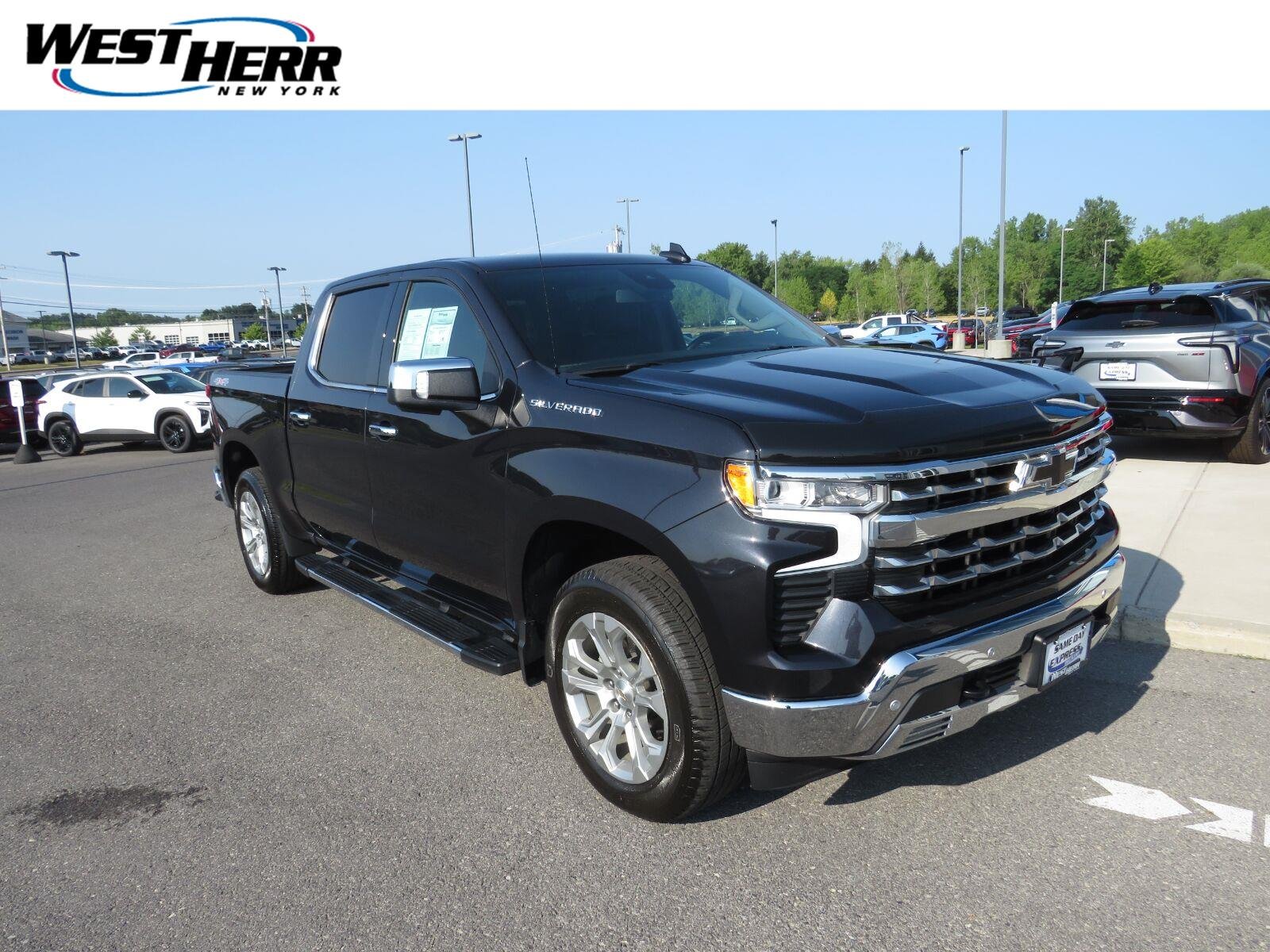 Used 2024 Dark Ash Metallic Chevrolet LTZ image 1
