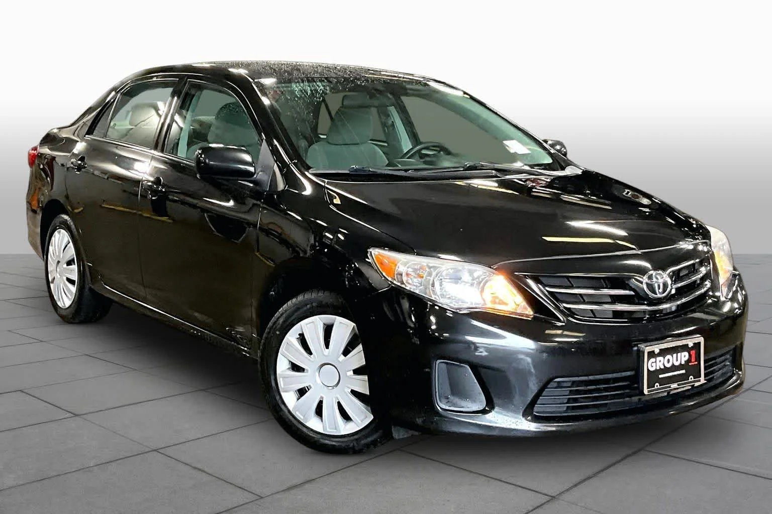 Used 2013 Black Sand Pearl Toyota LE image 3