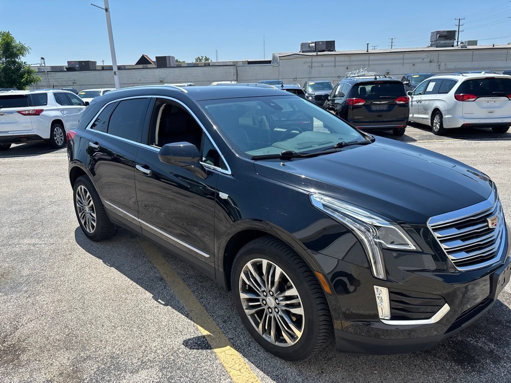 Used 2017 STELLAR BLACK METALLIC Cadillac Premium Luxury AWD image 5