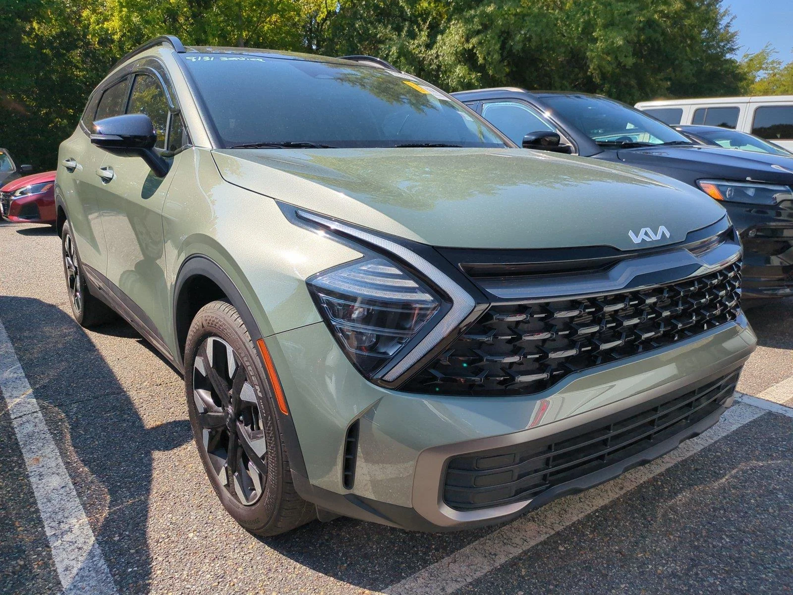 Used 2024 Jungle Green Kia X-Line image 1