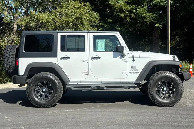 Used 2016 White Jeep Unlimited Sport image 3