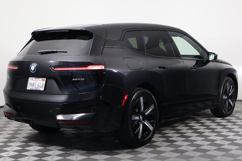 Certified Used 2024 Black Sapphire Metallic BMW xDrive50 image 4