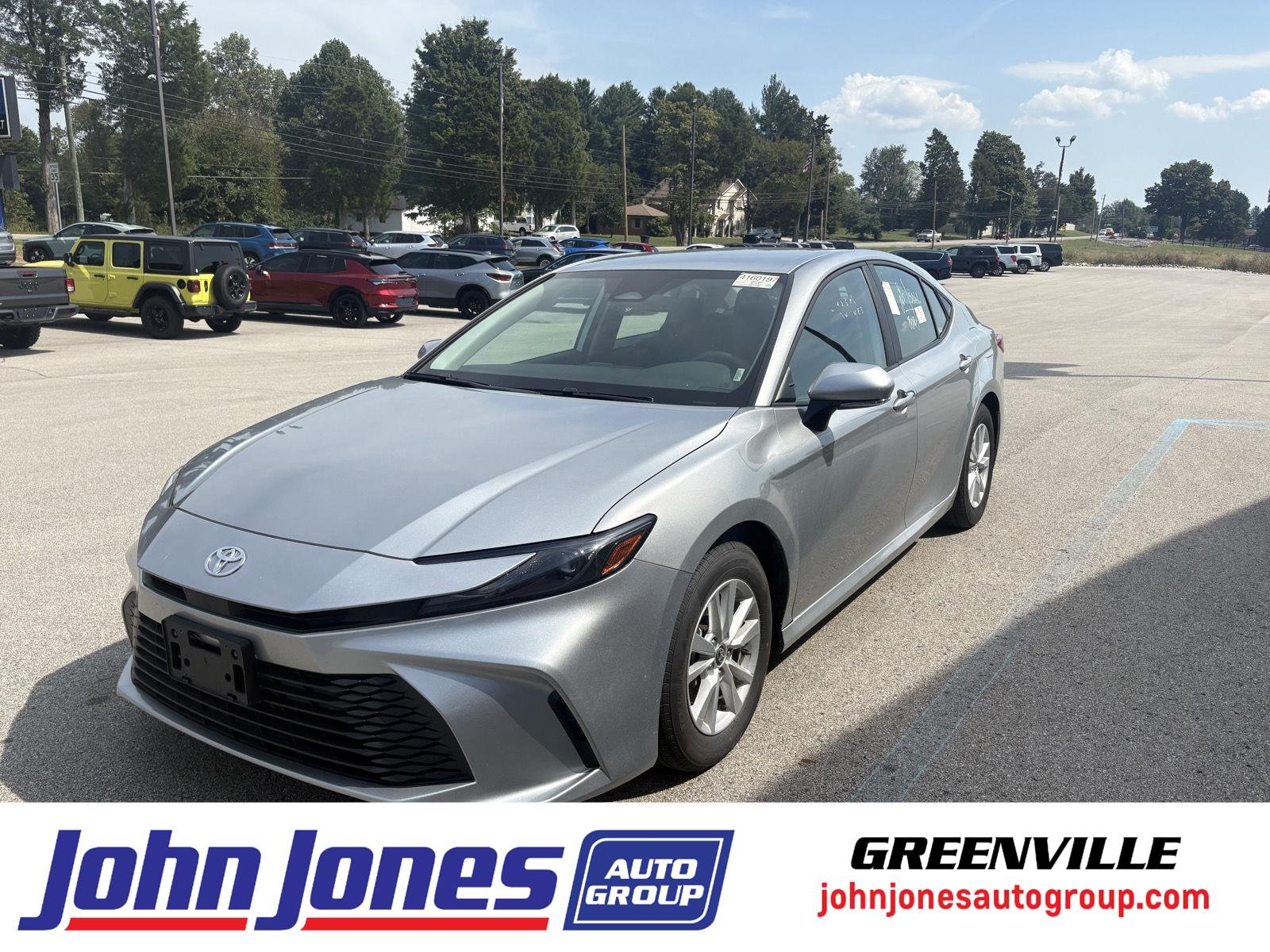 Used 2025 Celestial Silver Metallic Toyota LE image 1