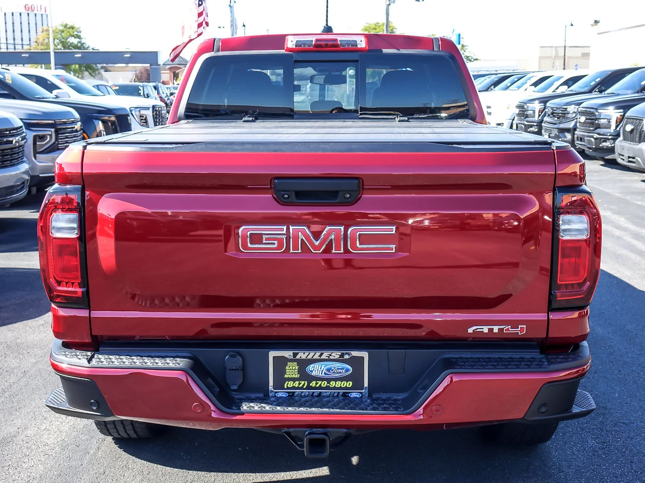 Used 2024 Volcanic Red Tintcoat GMC 4WD AT4 image 5