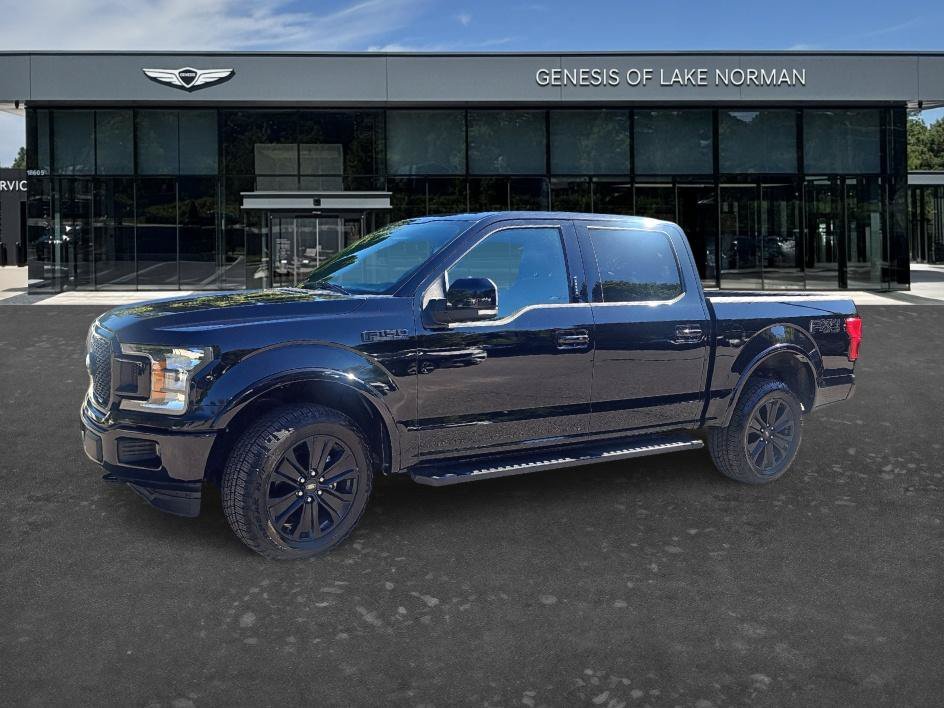 Used 2020 Agate Black Metallic Ford LARIAT image 1