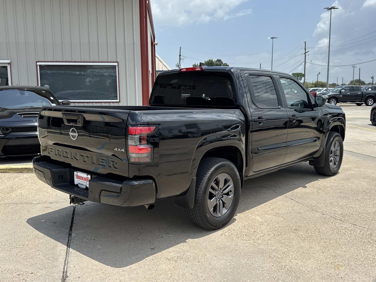 Used 2025 Super Black Nissan SV image 7