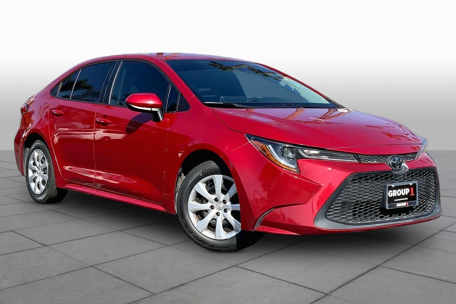Used 2021 Barcelona Red Metallic Toyota LE image 2