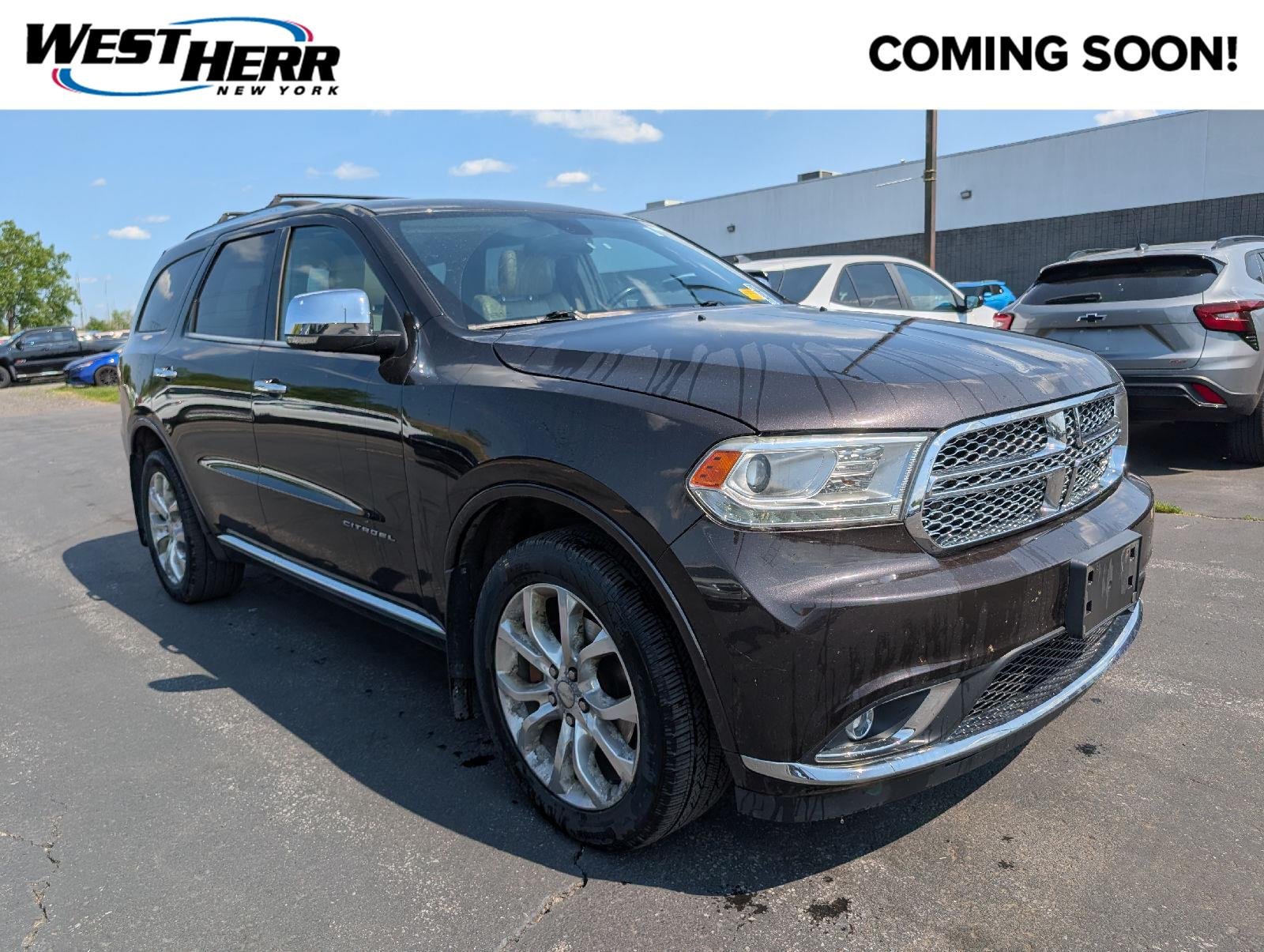 Used 2016 Luxury Brown Pearlcoat Dodge Citadel image 1