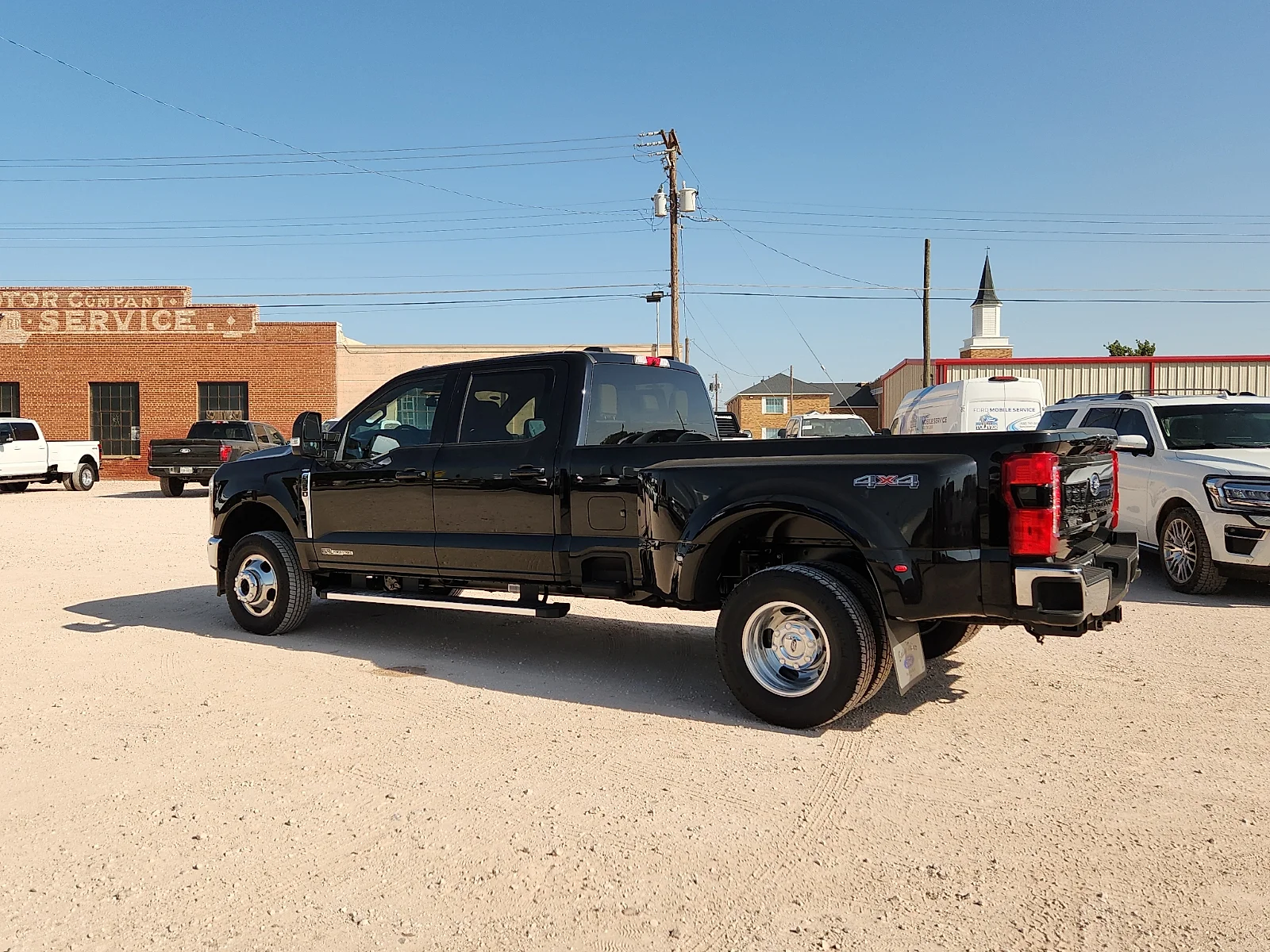 New 2026 Black Metallic Ford Lariat image 4