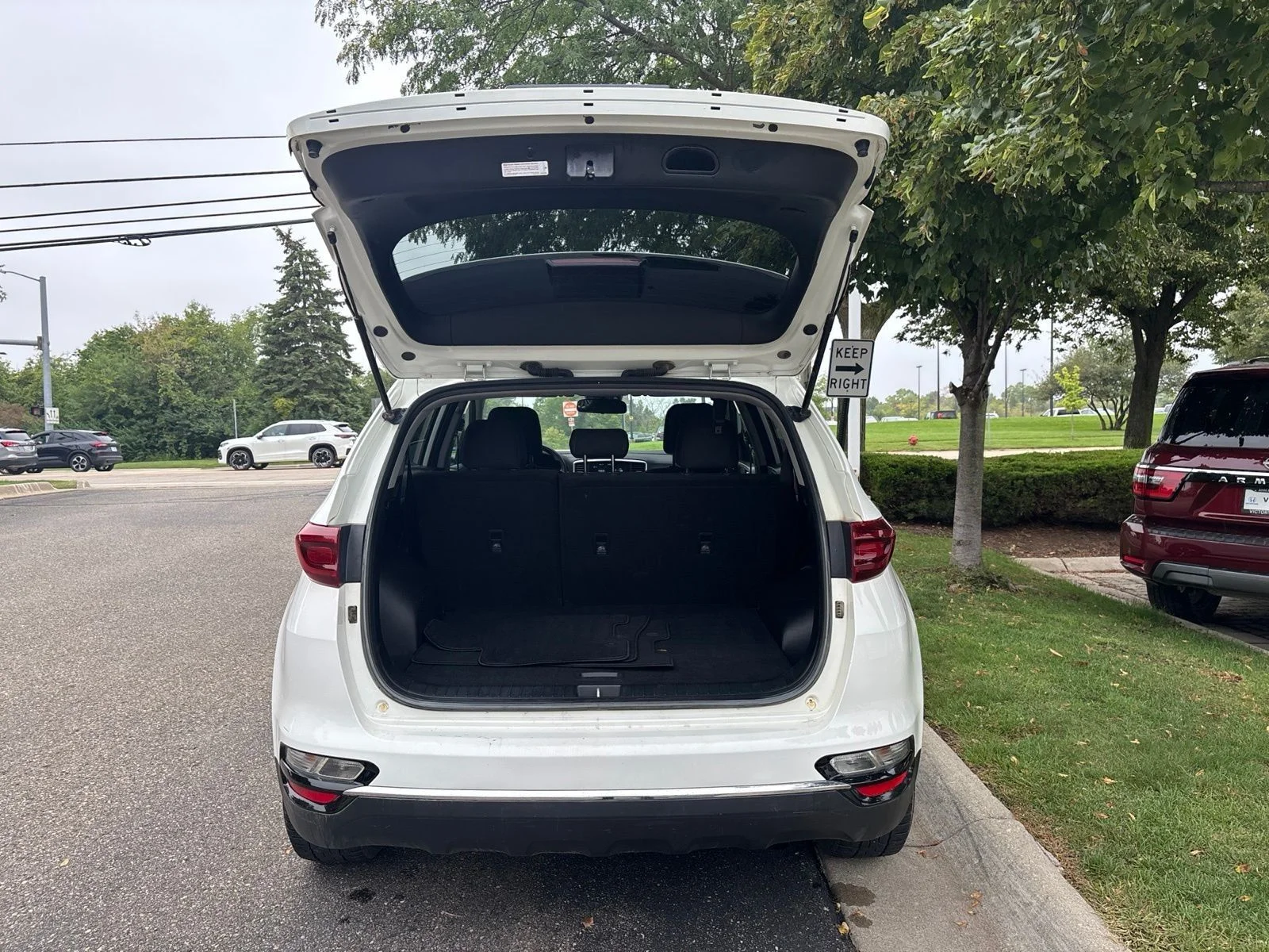 Used 2021 Clear White Kia LX image 13