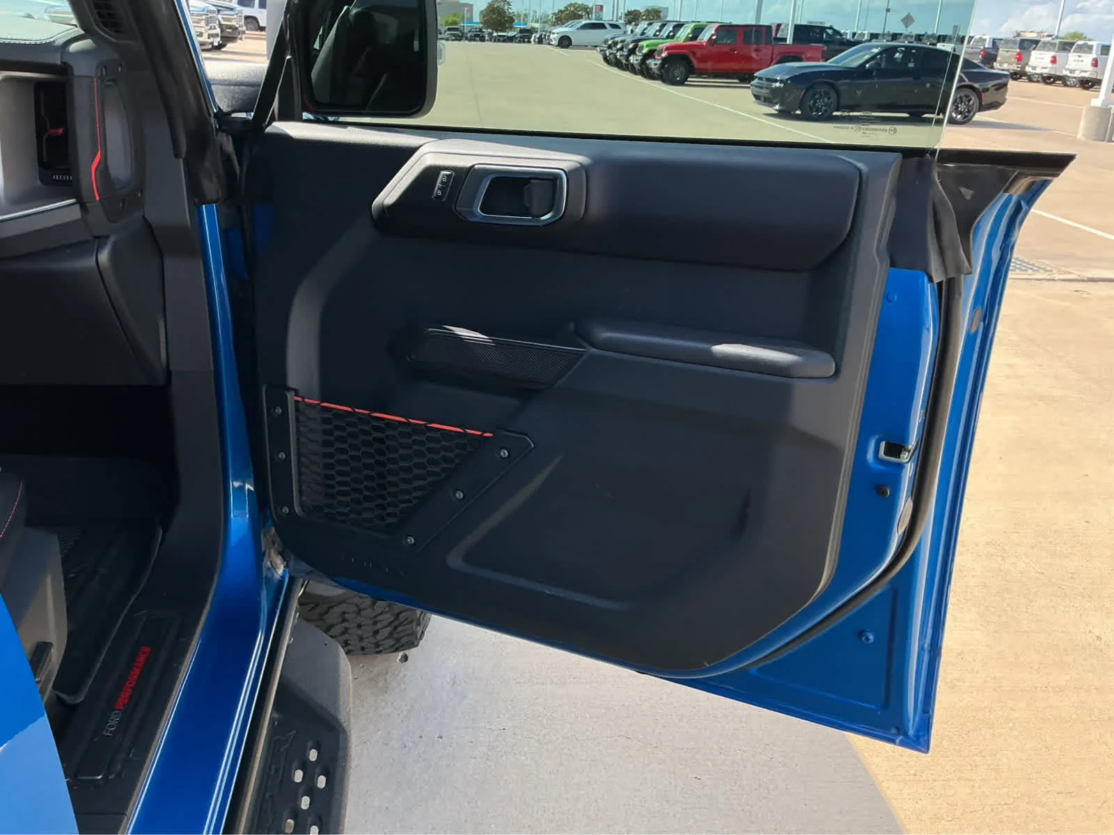 Used 2024 Velocity Blue Metallic Ford Raptor image 22
