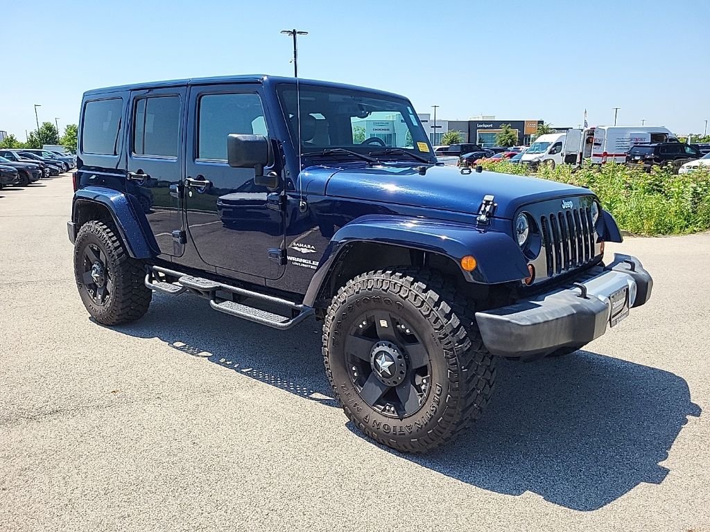 Used 2013 Blue Jeep Unlimited Sahara image 7