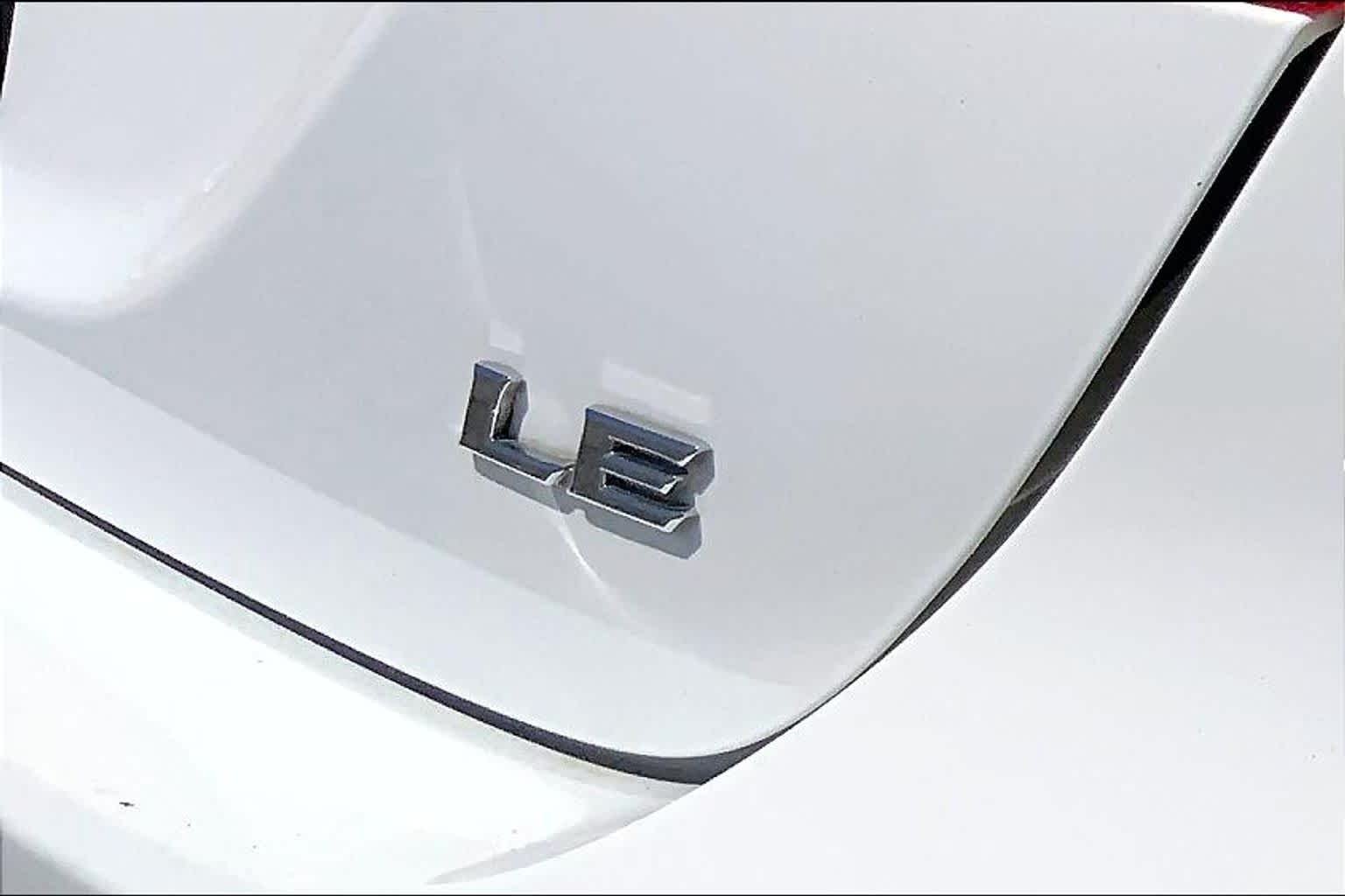 Used 2021 Super White Toyota LE image 30