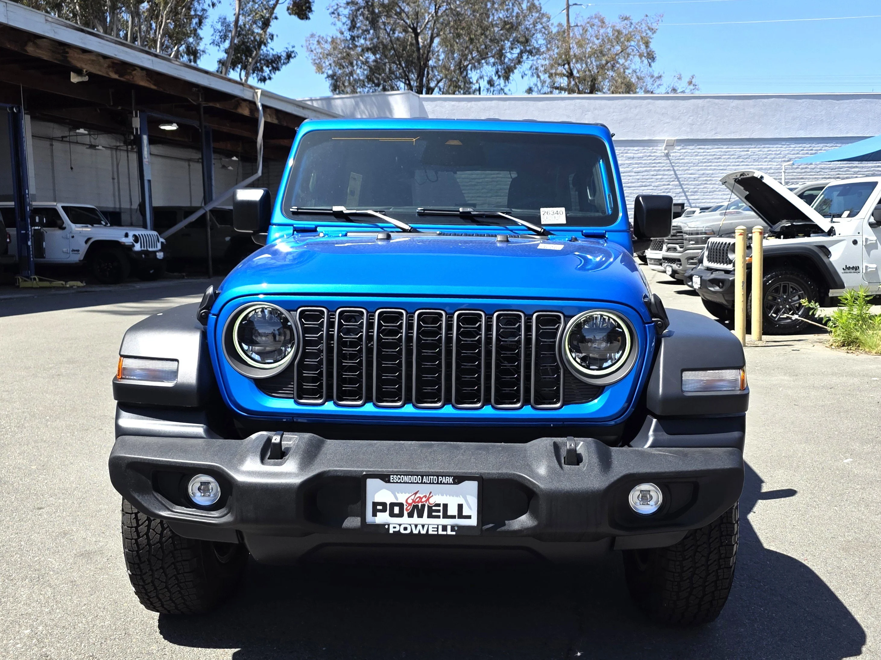 New 2026 Blue Pearl Jeep Sport S image 7