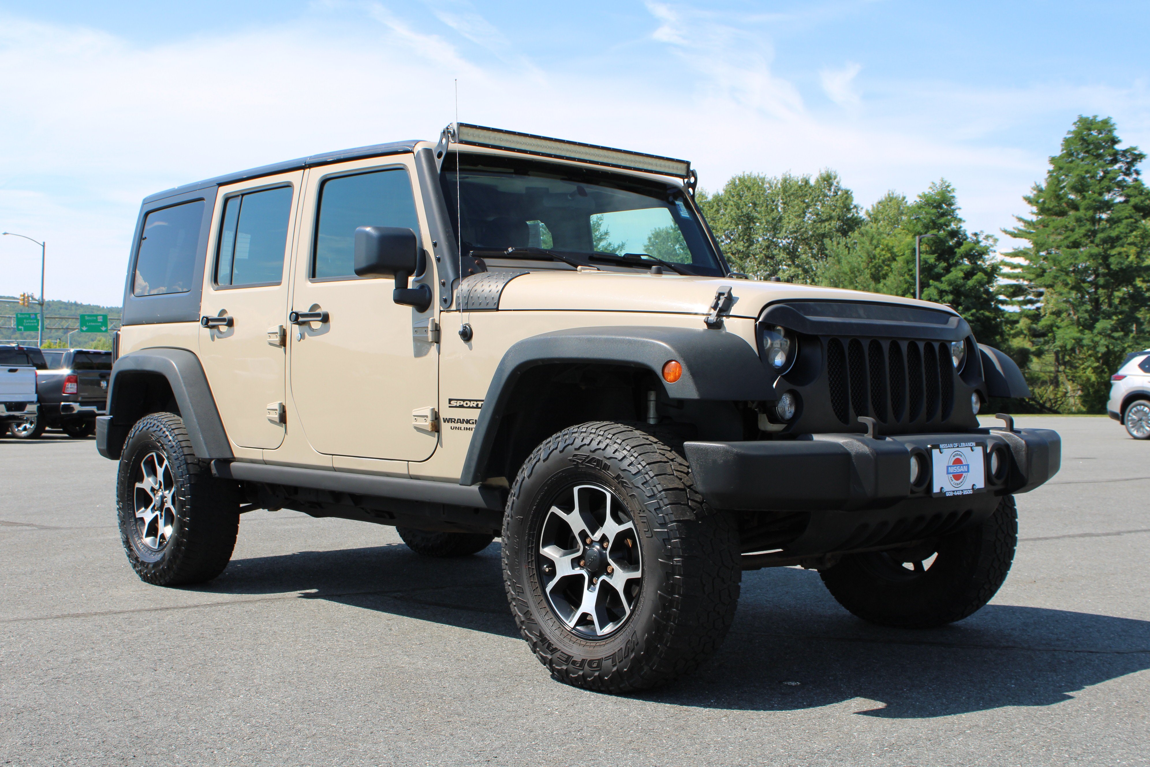 Used 2016 Mojave Sand Clearcoat Jeep Sport image 5