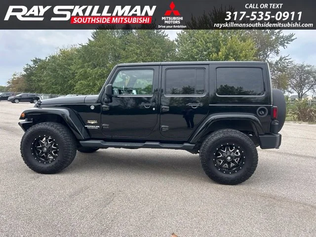 Used 2014 Black Jeep Unlimited Sahara image 8