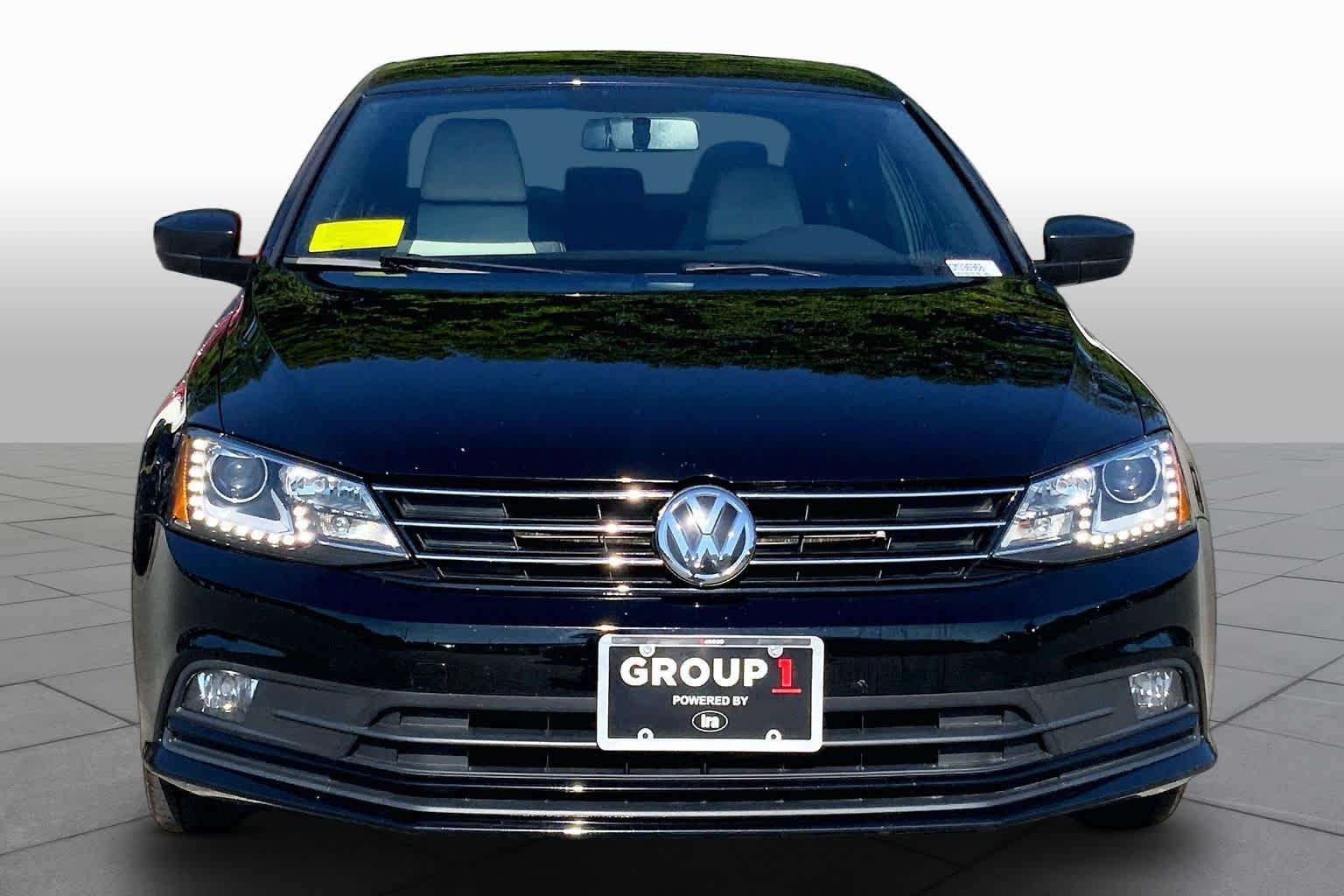 Used 2016 Black Volkswagen 1.8T Sport image 4