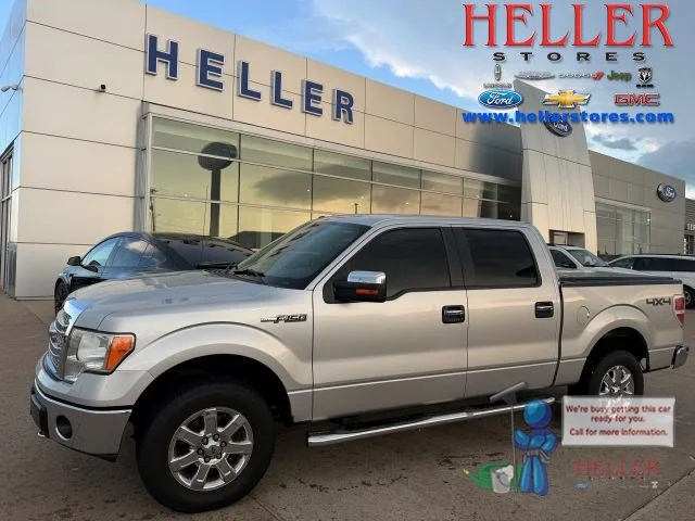 Used 2014 Ingot Silver Ford XLT image 1