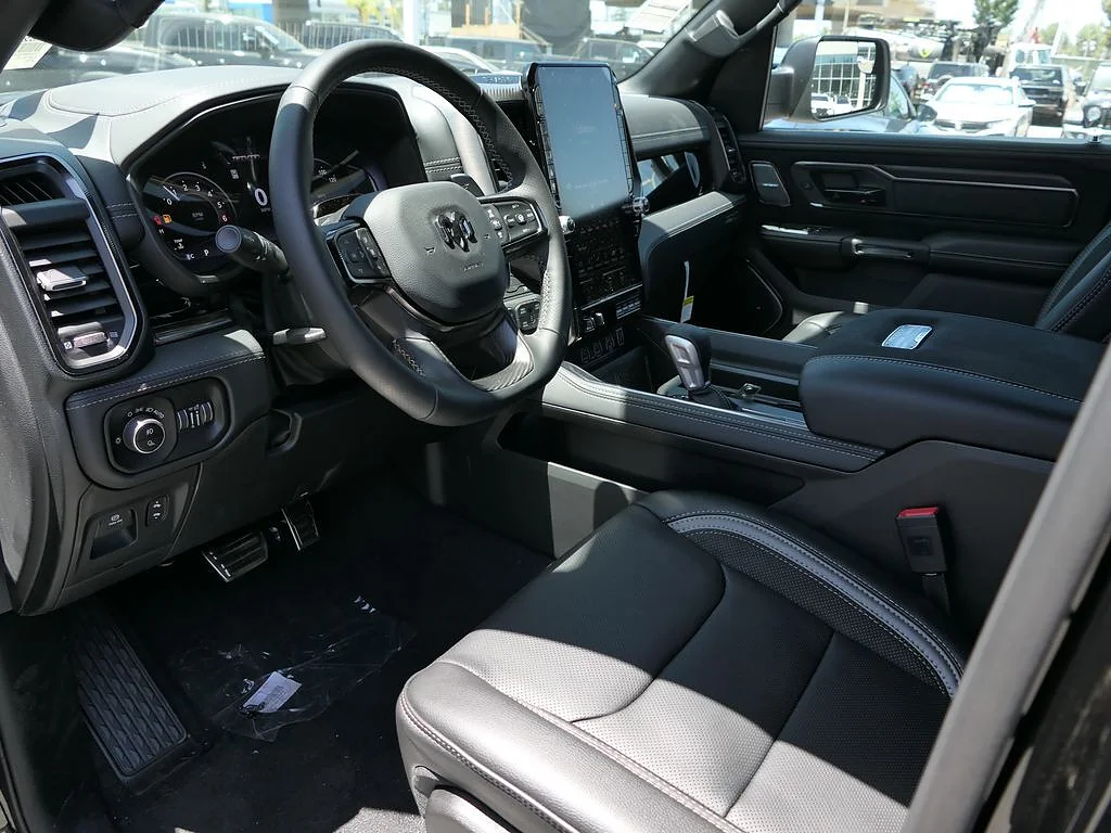 New 2026 Diamond Black Crystal Pearl Coat RAM RHO Crew Cab 4x4 5