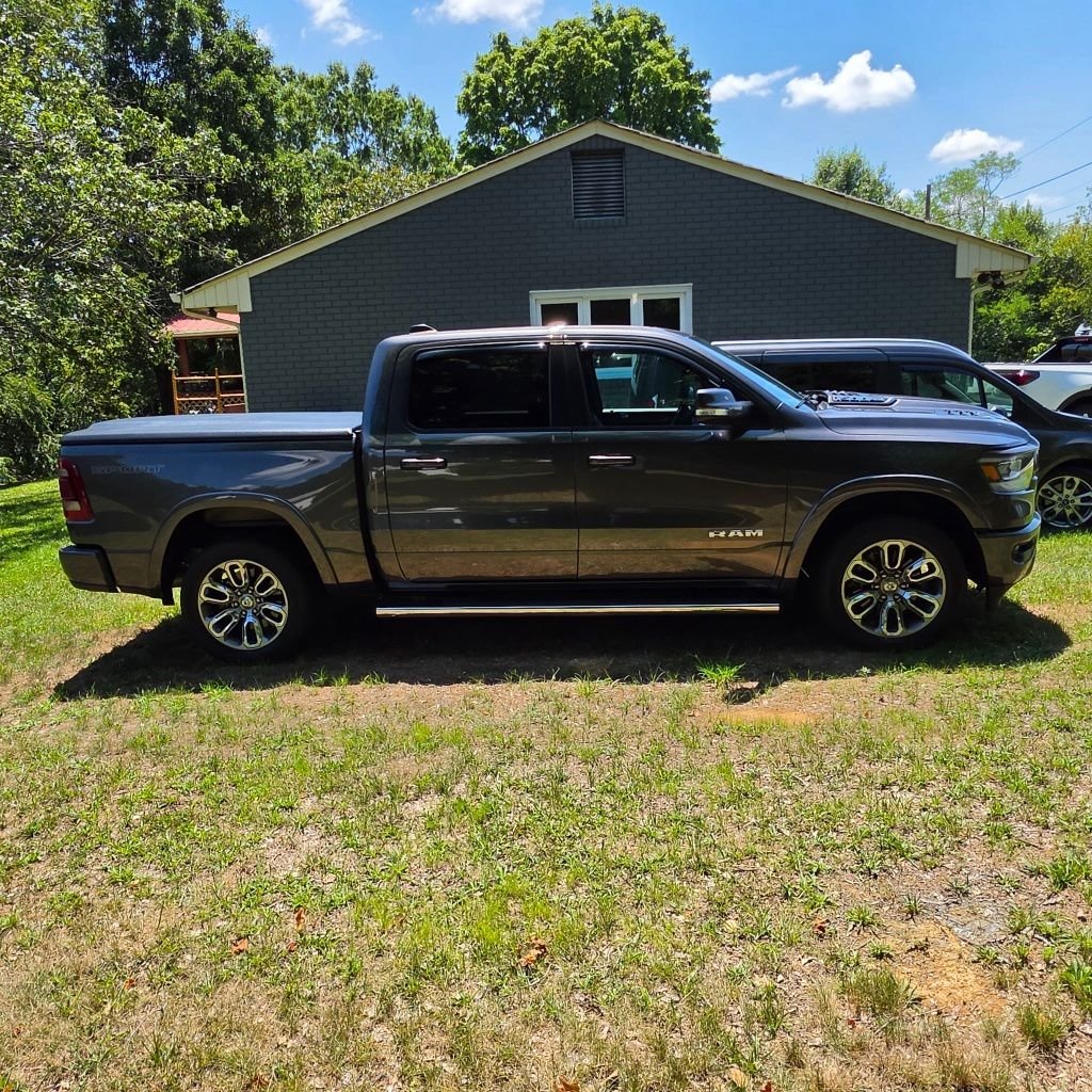 Used 2021 Gray Ram Laramie image 1