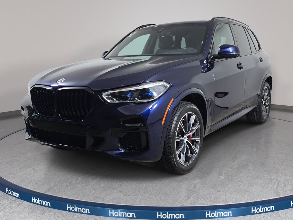 Used 2022 Tanzanite Blue II Metallic BMW M50i image 1