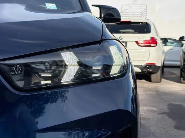 New 2026 Tanzanite Blue II Metallic BMW M60i image 9