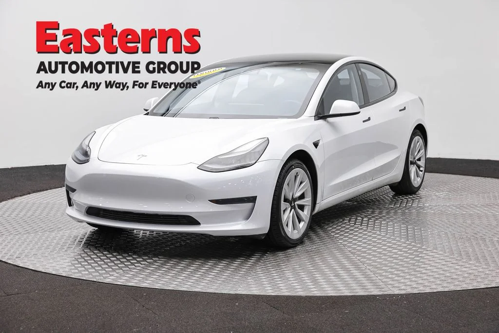 Used 2021 White Tesla Standard Range Plus image 1
