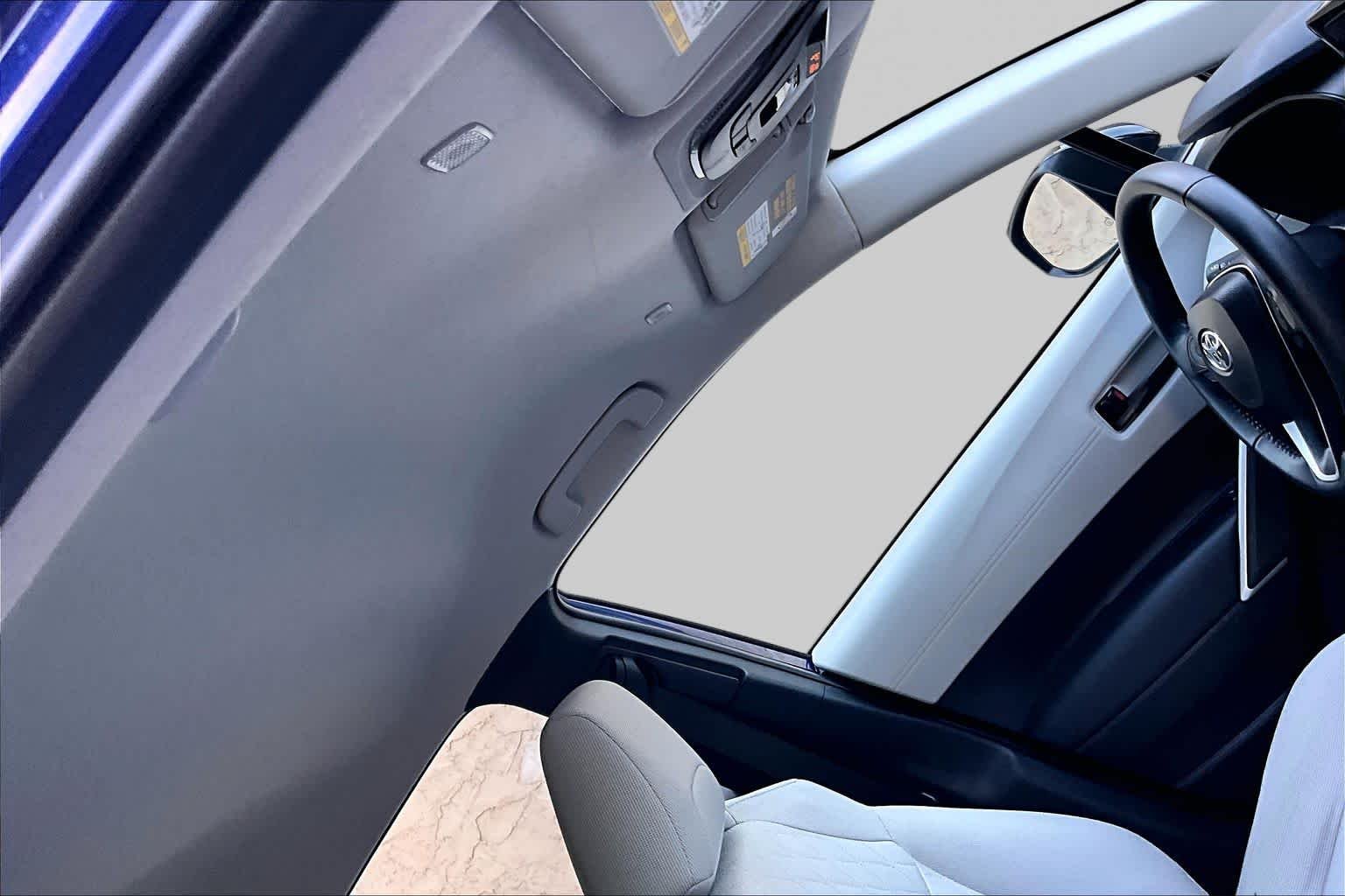 Used 2025 Blue Crush Metallic Toyota LE image 14