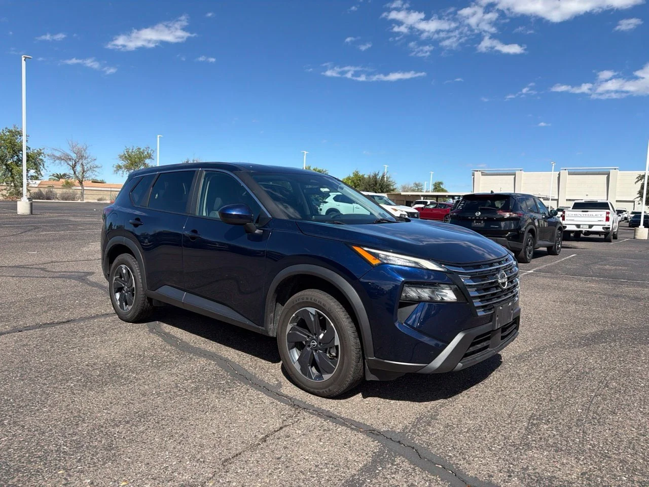 Used 2024 Deep Ocean Blue Pearl Nissan SV image 2