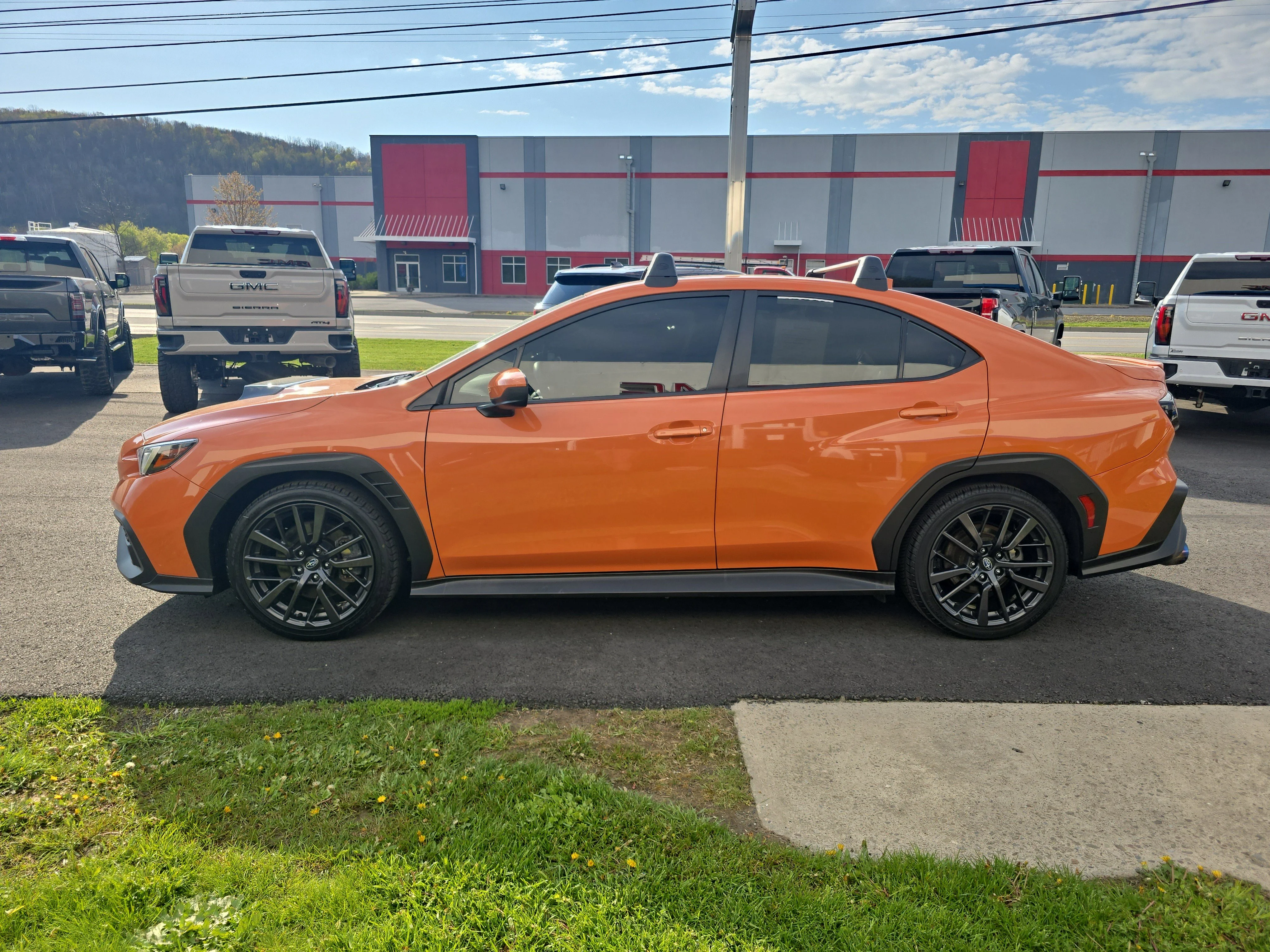 Used 2023 Solar Orange Pearl Subaru Premium image 7