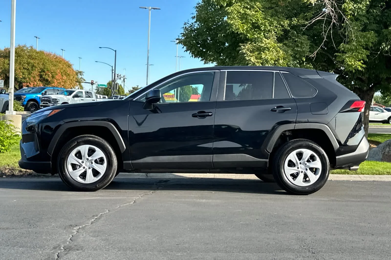 Certified Used 2025 Midnight Black Metallic Toyota LE image 5