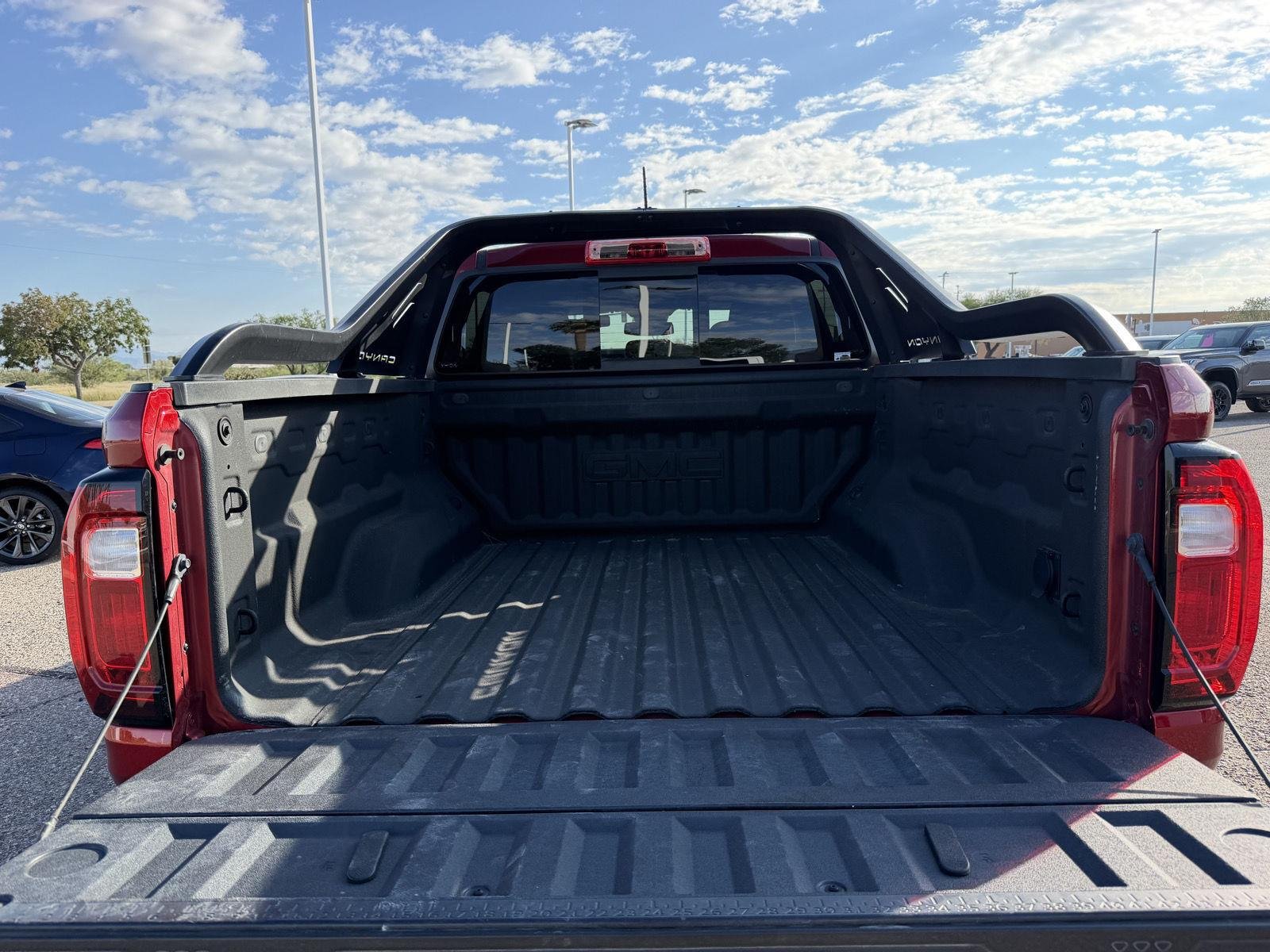 Used 2025 Volcanic Red Tintcoat GMC 4WD AT4 image 5