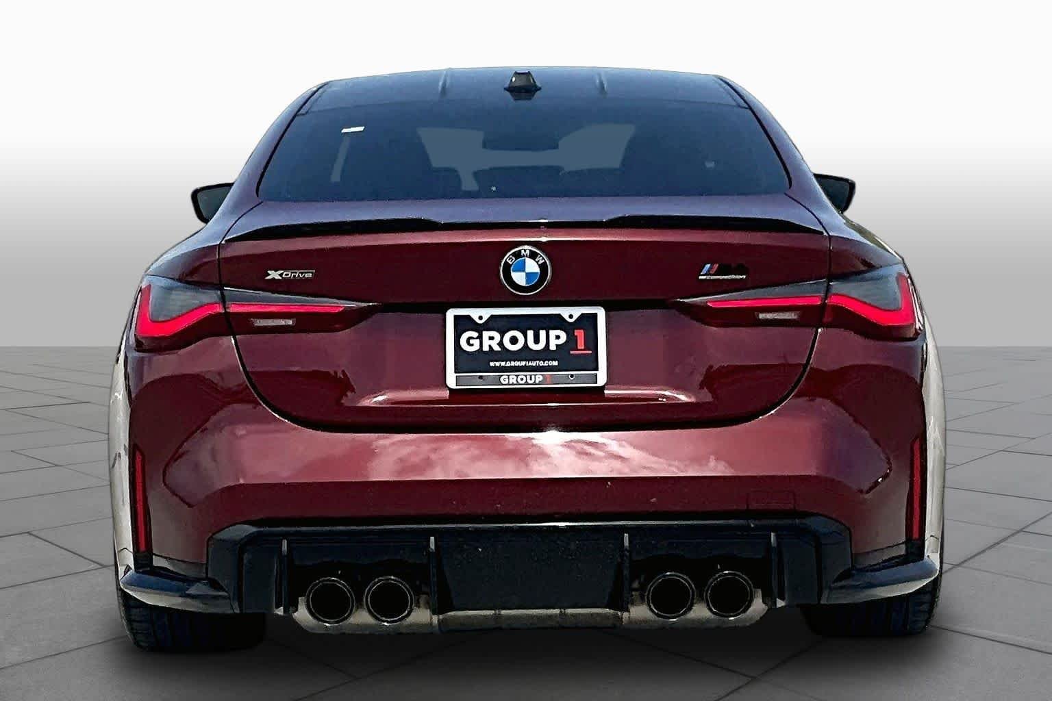 Used 2024 Aventurin Red Metallic BMW Competition xDrive image 4