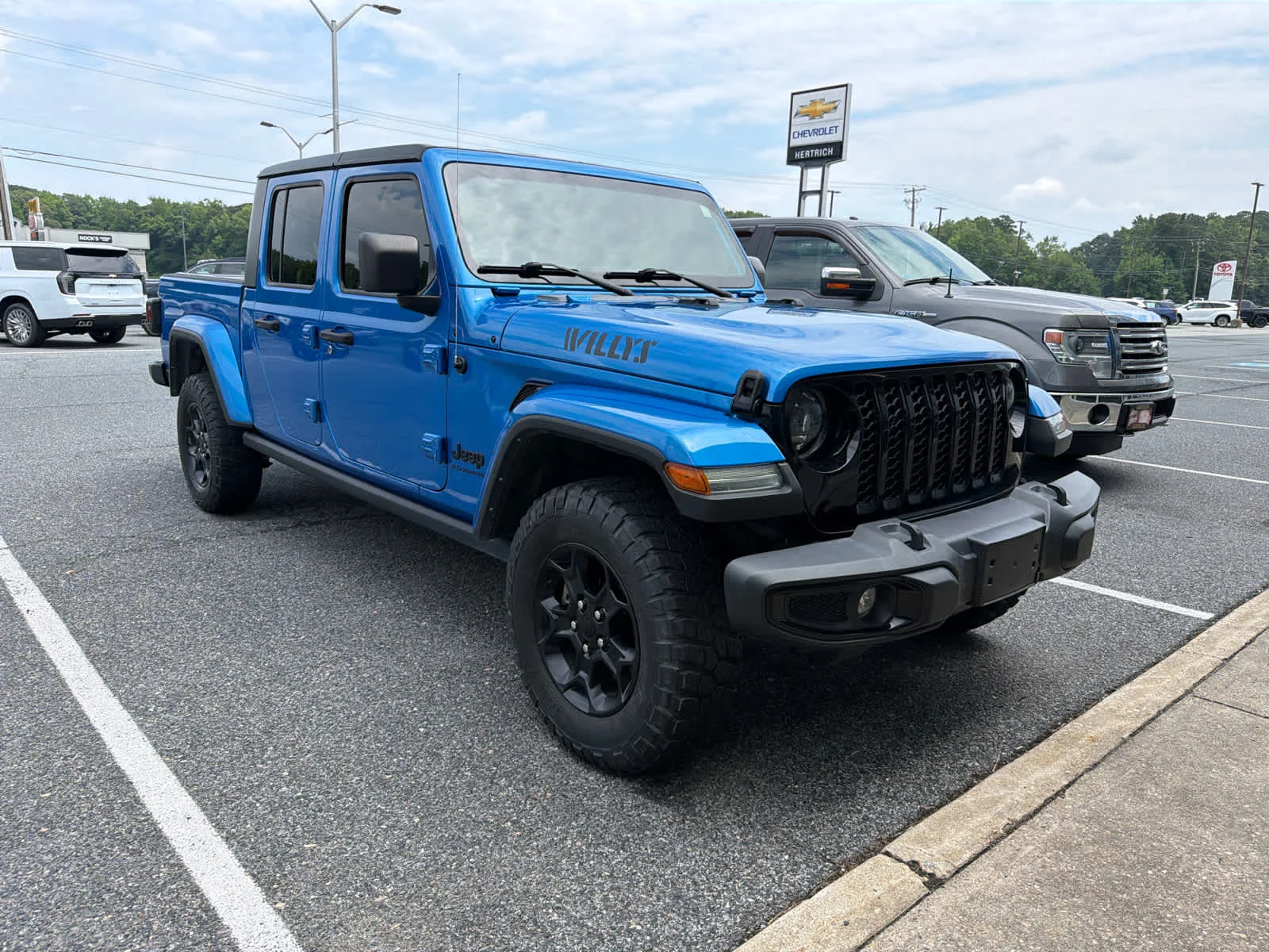 Certified Used 2023 Hydro Blue Pearlcoat Jeep Willys image 2