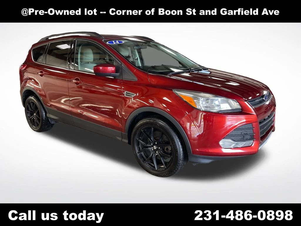 Used 2014 Orange Ford SE image 7