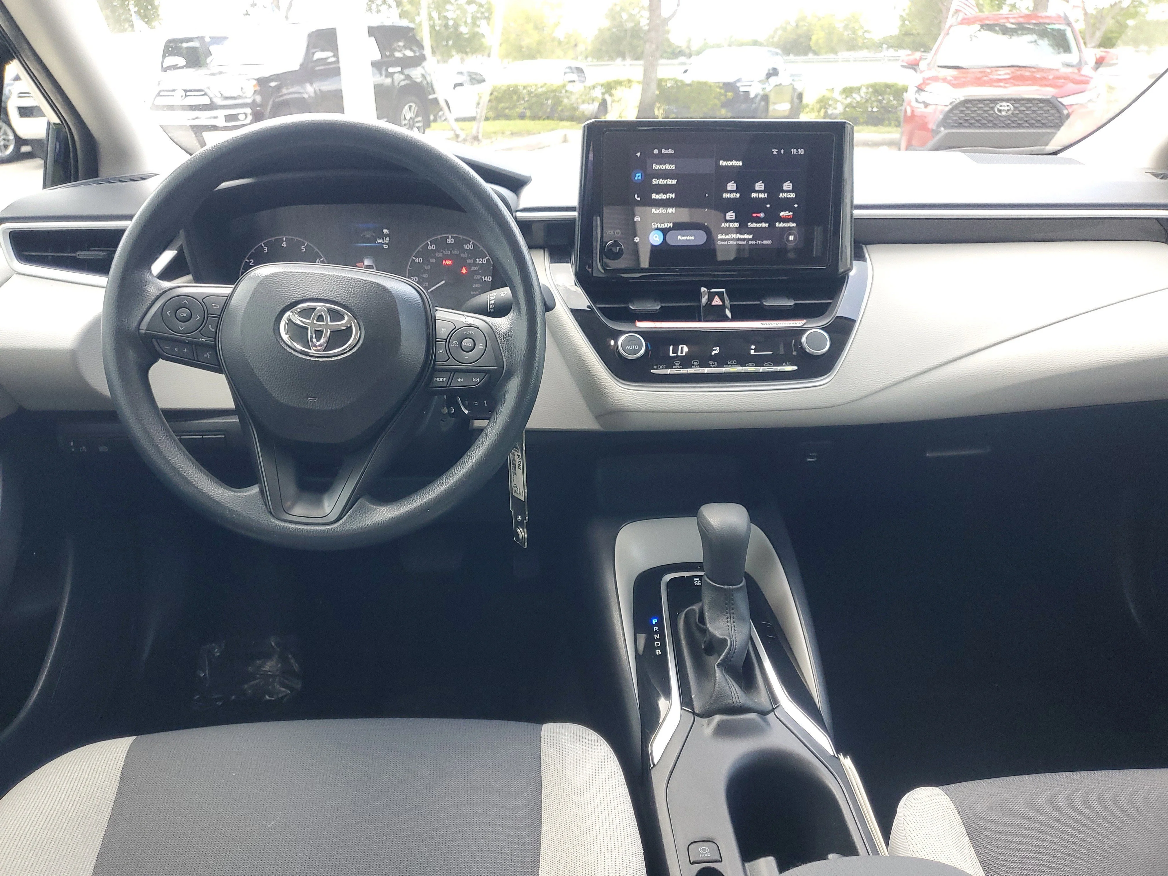 Used 2025 Midnight Black Metallic Toyota LE image 9