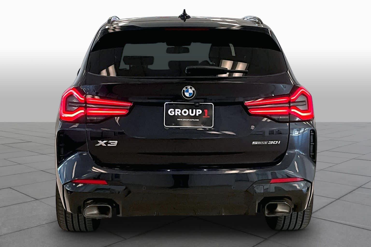 Certified Used 2023 Carbon Black Metallic BMW sDrive30i image 4