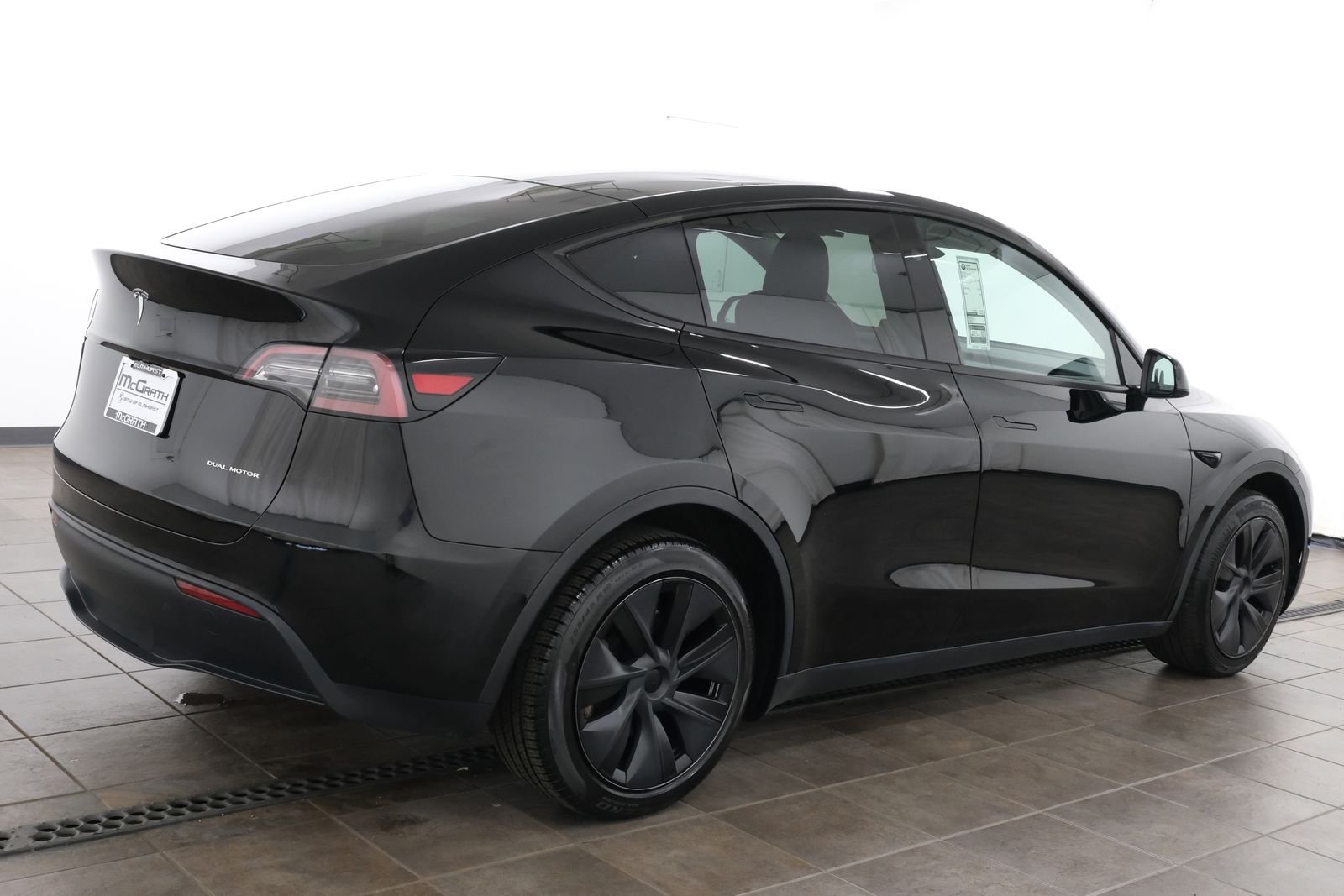 Used 2024 Solid Black Tesla Long Range image 7