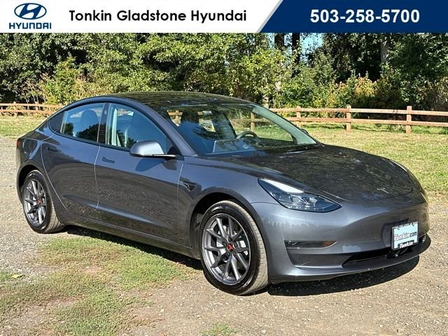 Used 2023 Midnight Silver Metallic Tesla Base image 1