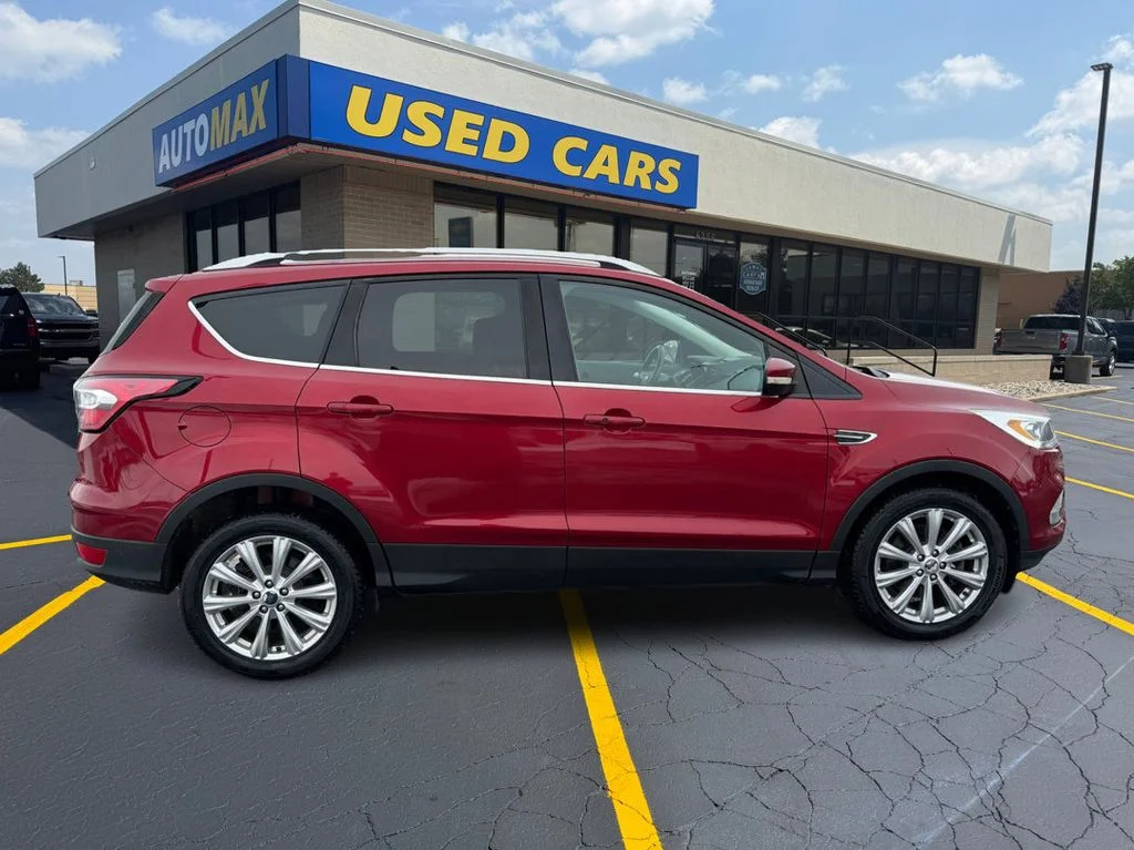Used 2017 Ford Escape Titanium with VIN 1FMCU0J94HUD60628 for sale in Traverse City, MI
