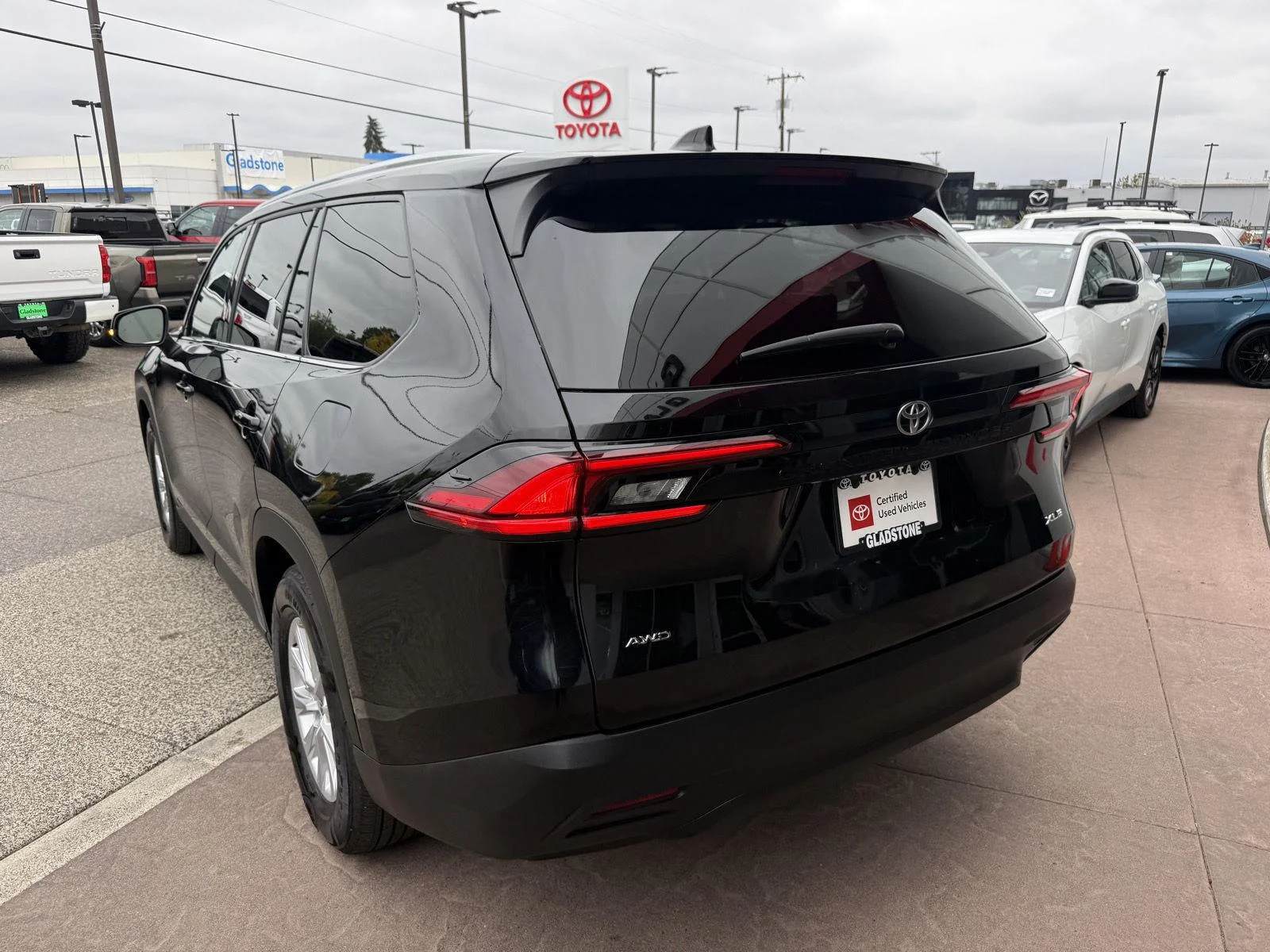 Used 2025 Midnight Black Metallic Toyota XLE image 6